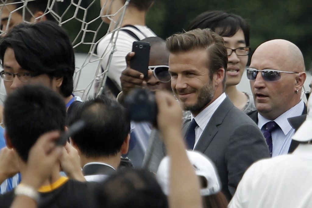 FOTO: Beckham povzročil kitajski stampedo
